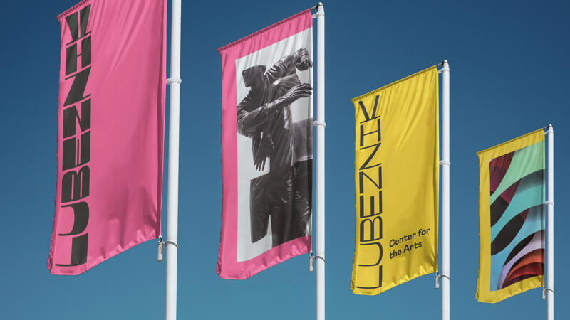 Four flags featuring artwork and the Lubeznik logo